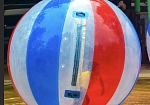 Фотография "АКВАЗОРБ ЦВЕТНОЙ" - аттракцион водный шар надувной из ТПУ с цветными секциями (красная, синяя) из ТПУ (TPU) 0,7 мм ТаймТриал